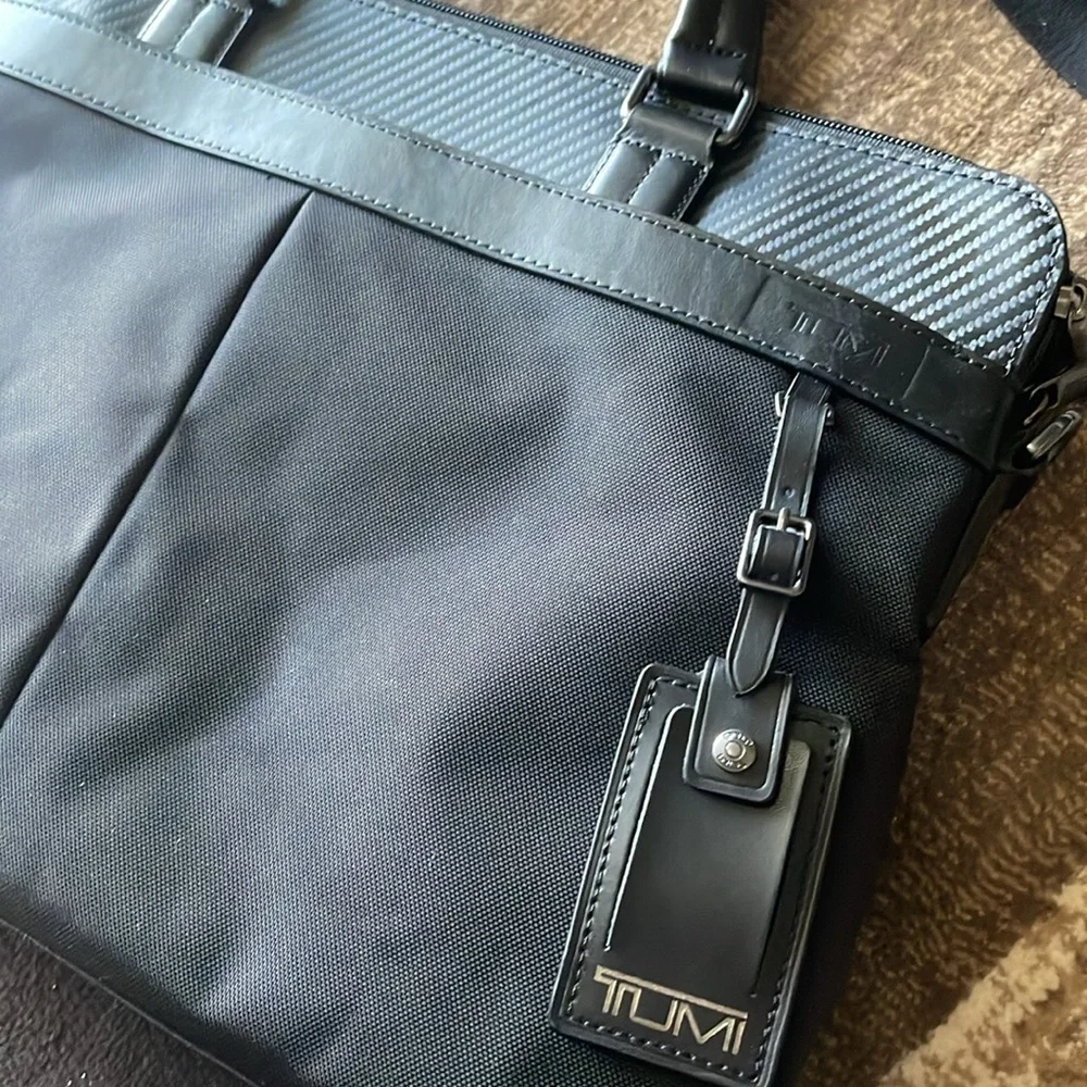 Tumi Canvas Black Laptop Bag with Carbon Fiber Accents